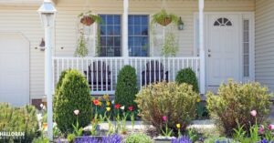 exterior of a home with colorful tulips - Halloran Brothers spring remodel