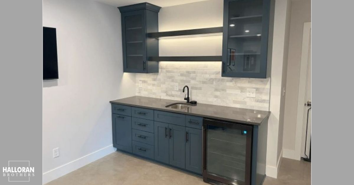 newly built wet bar with dark blue cabinets - Halloran Brothers spring remodel
